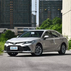 Left front view of a silver Toyota CAMRY 2.5Q electric car.