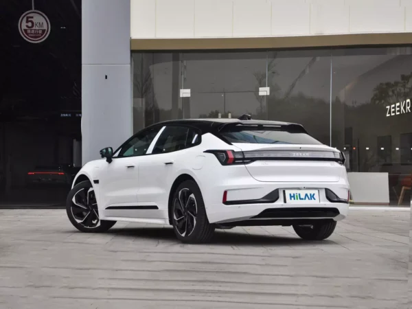 A left rear view of a white ZEEKR 001 electric car with the HiLuck logo on the license plate hanging from the rear.