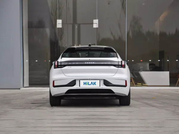 Rear view of a white ZEEKR 001 electric car with the HiLuck logo on the license plate hanging from the rear.