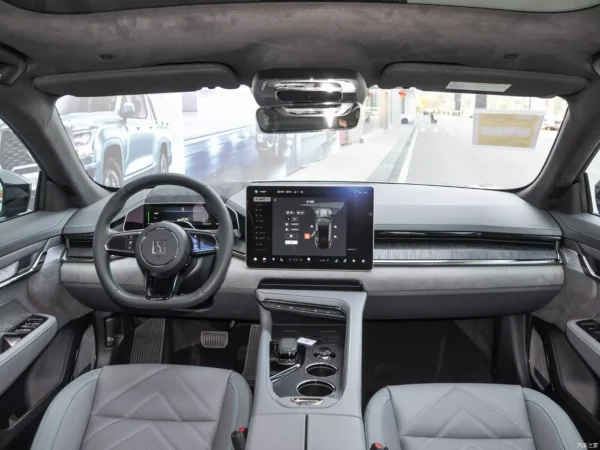 Detailed image of the interior cab of a ZEEKR 001 electric car with gray seats and trim.